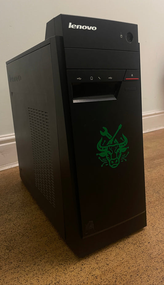 Lenovo computer tower with green logo on a surface